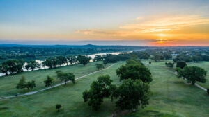 Aerial view of the course and river at dusk