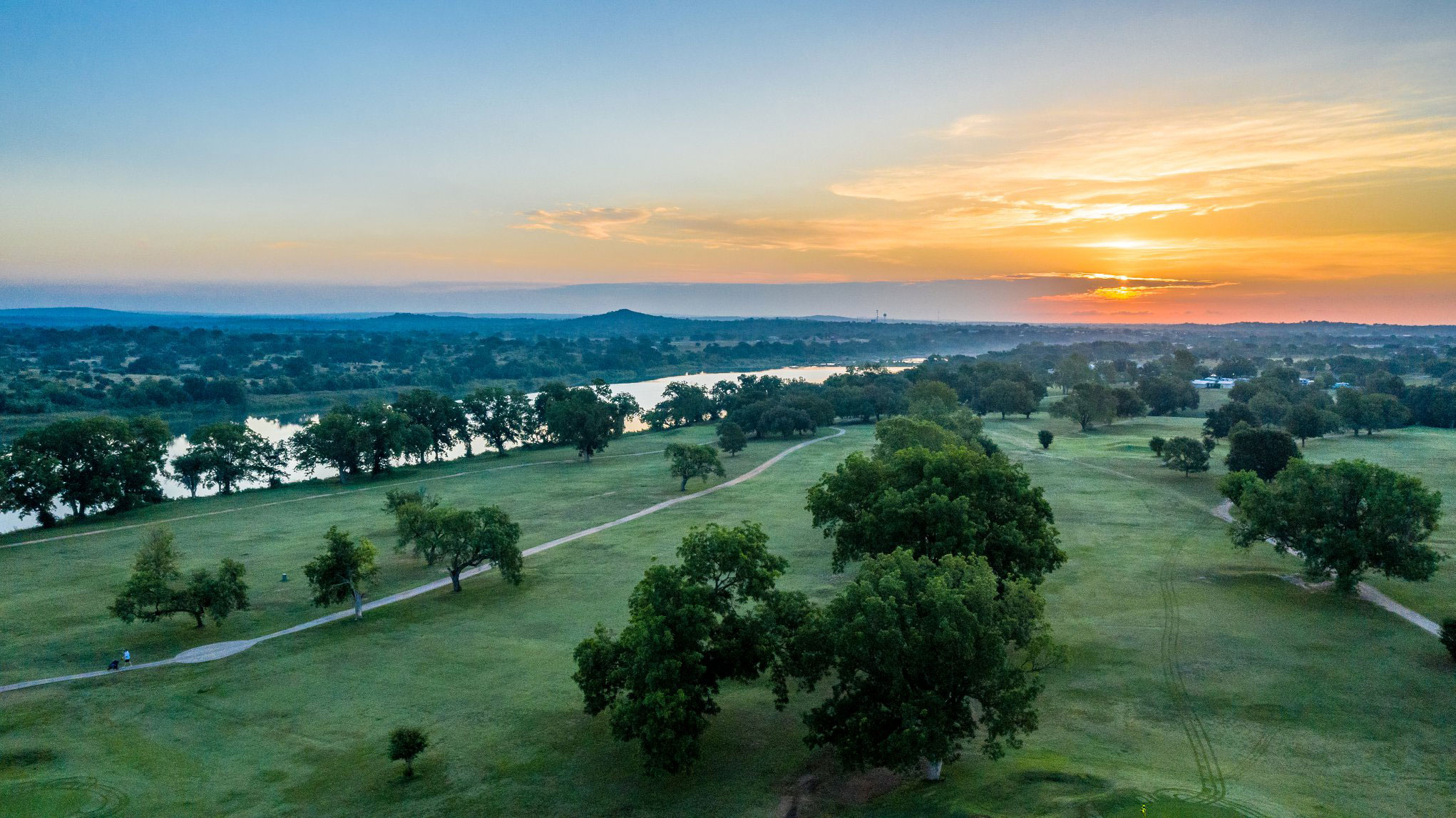 Aerial view of the course and river at dusk