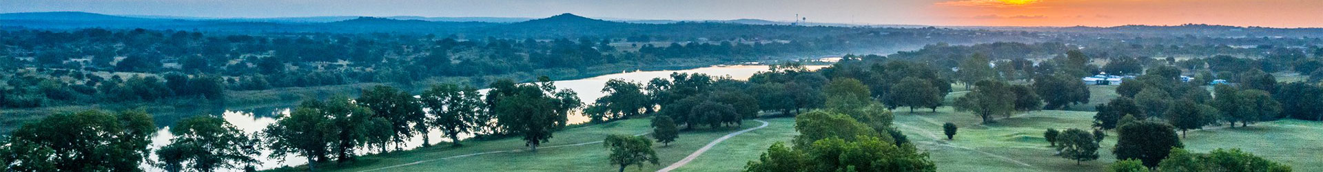 Aerial view of the course and river at dusk